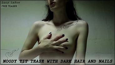 “Moody Tit Tease with Dark Hair and Nails”